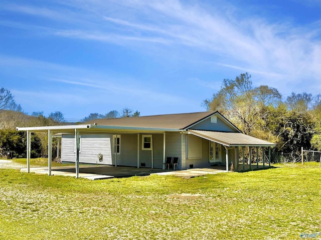 15766 Alabama Highway 79, Scottsboro, AL 35768 - view of front of house with a front lawn, a patio area, and metal roof