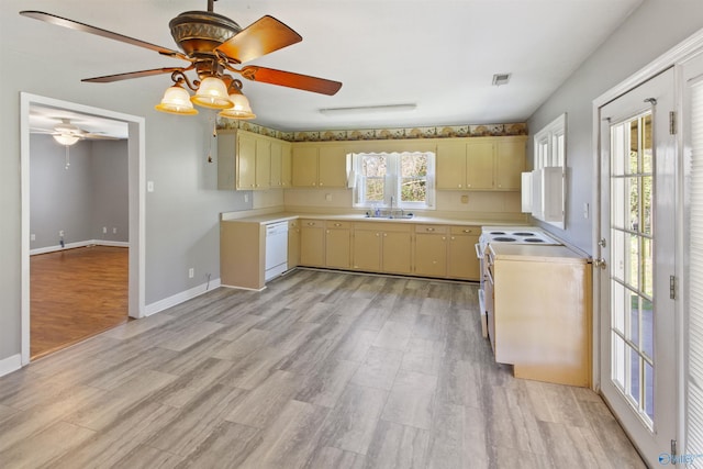 15766 Alabama Highway 79, Scottsboro, AL 35768 - kitchen featuring light countertops, white appliances, light wood finished floors, ceiling fan, and baseboards
