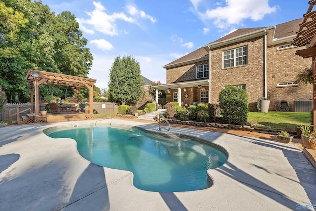 view of swimming pool with a fenced in pool, a patio, a fenced backyard, a deck, and a pergola