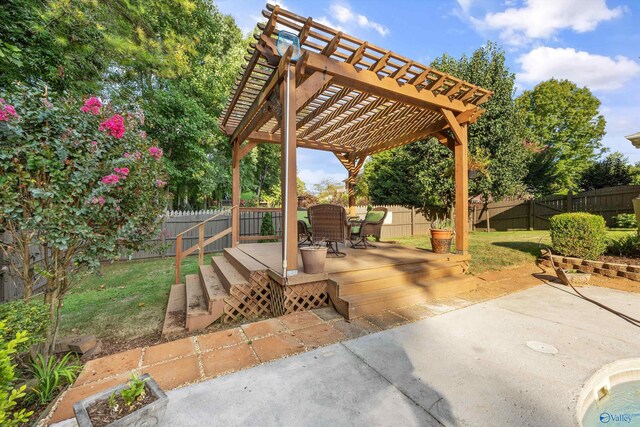 exterior space with a pergola and a wooden deck