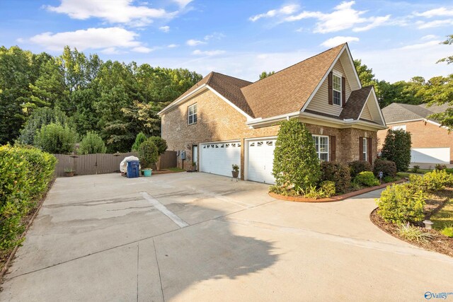 view of property exterior with a garage