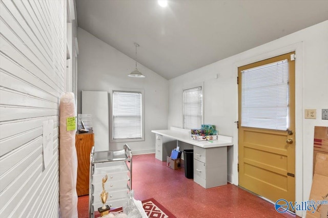 home office with vaulted ceiling