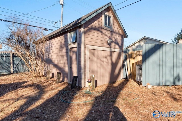 view of home's exterior with a shed