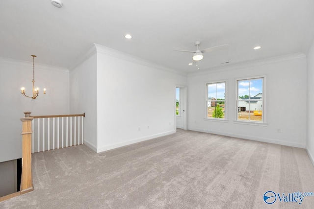 carpeted empty room with crown molding and ceiling fan with notable chandelier