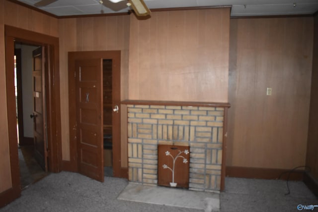 carpeted living room featuring a fireplace