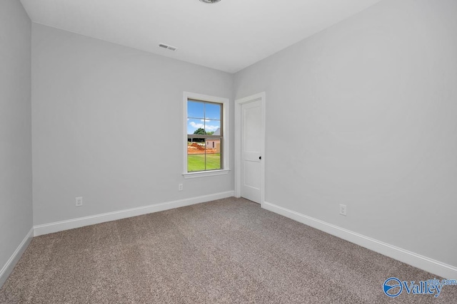 view of carpeted spare room