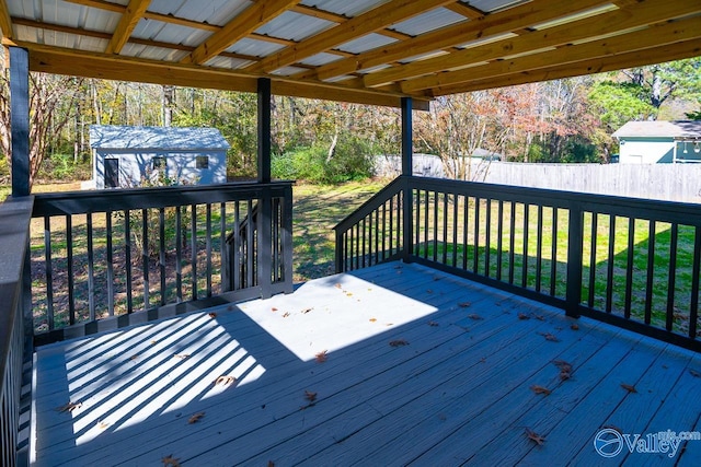 deck featuring a shed