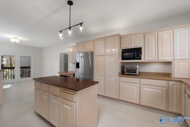 kitchen featuring a center island, french doors, stainless steel refrigerator with ice dispenser, decorative light fixtures, and black microwave