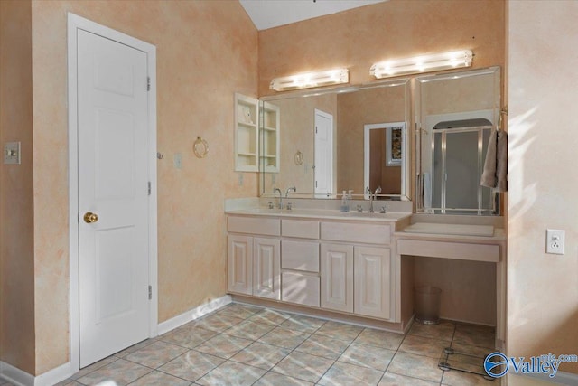 bathroom featuring tile patterned floors and vanity