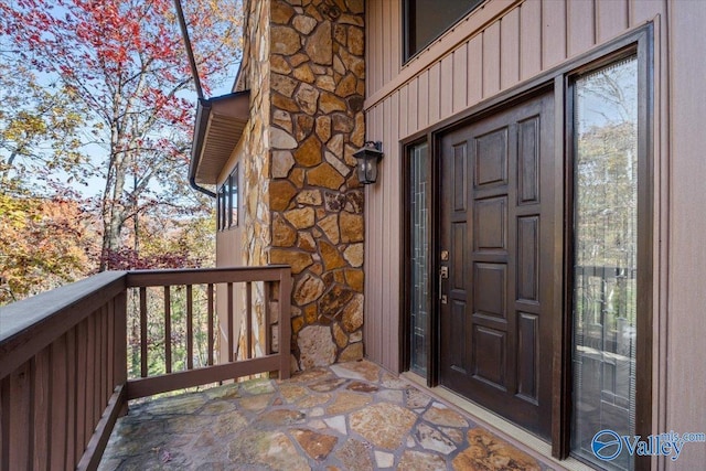 doorway to property featuring a balcony