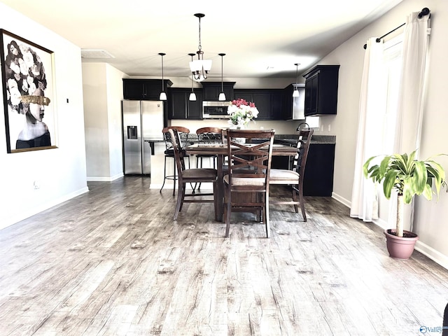 dining area featuring light hardwood / wood-style floors