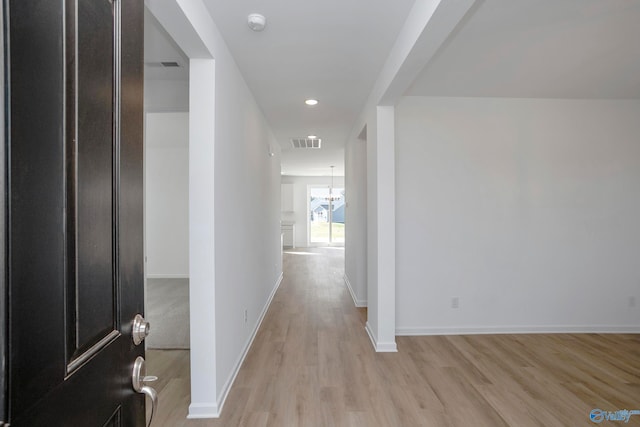 hallway featuring light hardwood / wood-style floors