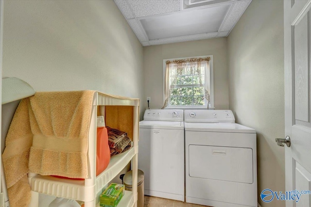 laundry area with washing machine and dryer