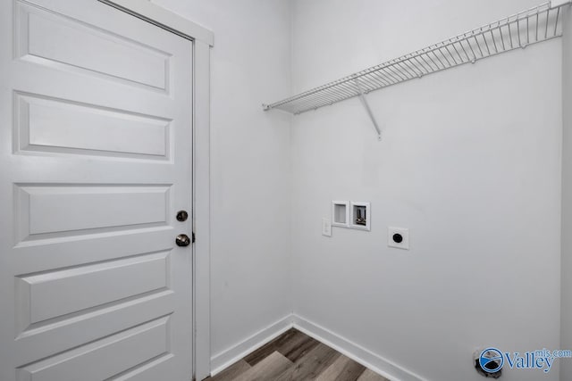 laundry room with dark wood finished floors, hookup for a washing machine, hookup for an electric dryer, laundry area, and baseboards