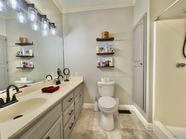 bathroom with crown molding, tile patterned flooring, vanity, and toilet