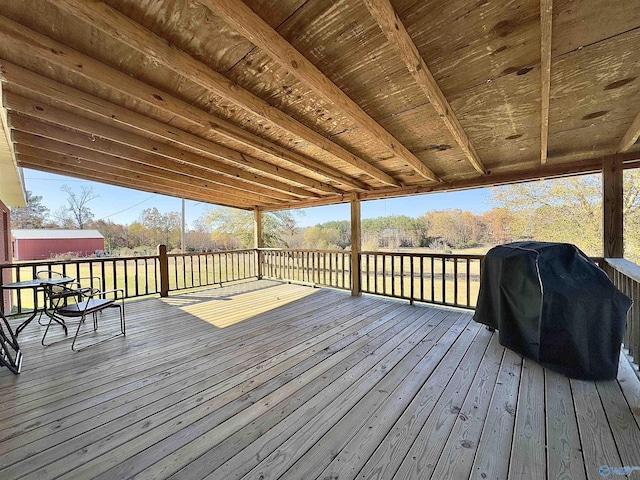 wooden deck with area for grilling