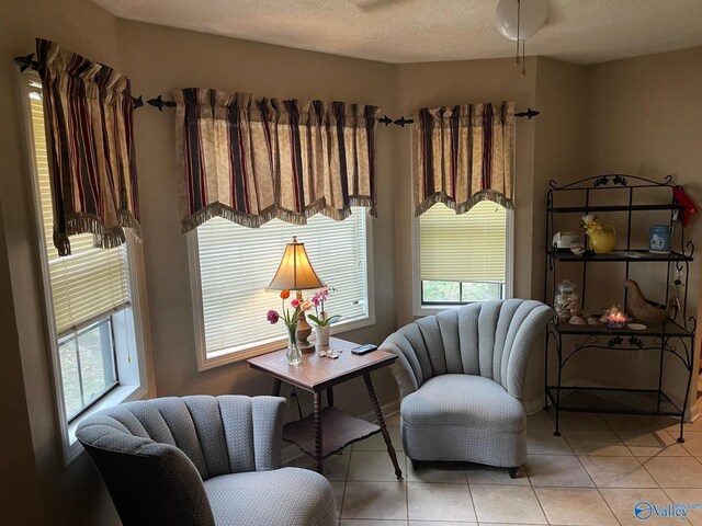 living area with light tile patterned floors