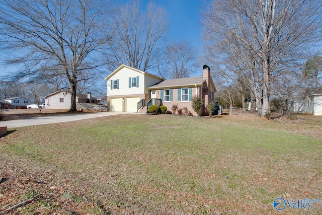 split level home featuring a front yard and a garage