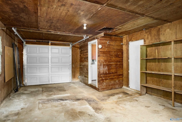 garage with wooden walls