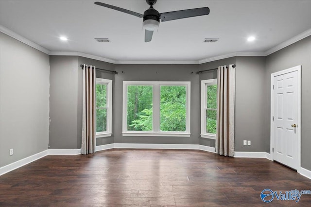 unfurnished room featuring ornamental molding and dark hardwood / wood-style flooring