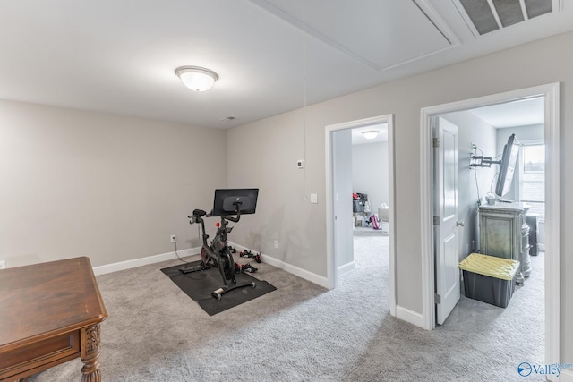 workout room with carpet floors, attic access, visible vents, and baseboards