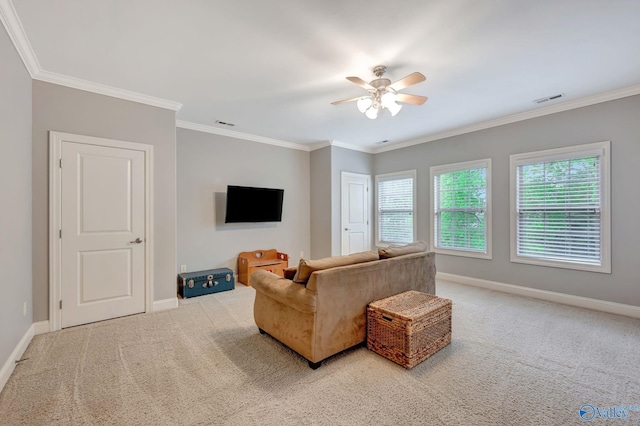 carpeted living room with baseboards, visible vents, ornamental molding, and ceiling fan