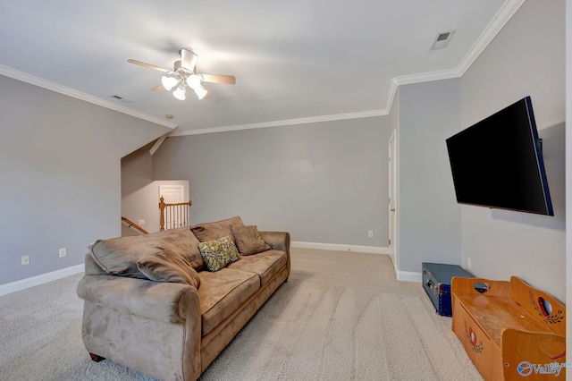 carpeted living room featuring baseboards, visible vents, a ceiling fan, and crown molding