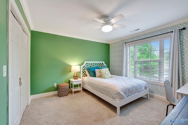 bedroom featuring baseboards, visible vents, ornamental molding, and wallpapered walls