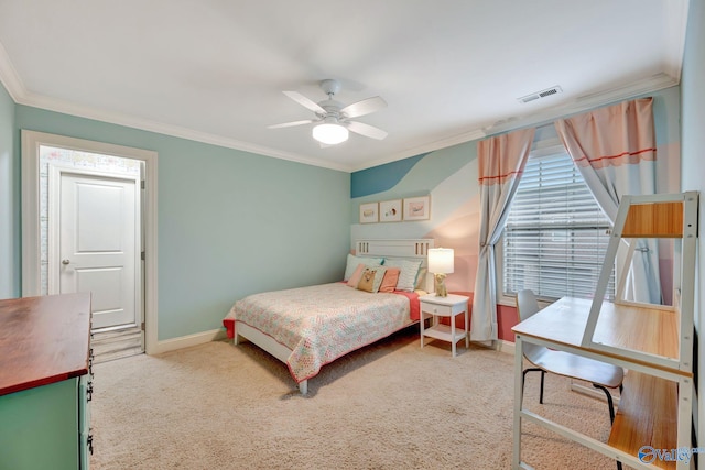 carpeted bedroom featuring visible vents, crown molding, a ceiling fan, and baseboards