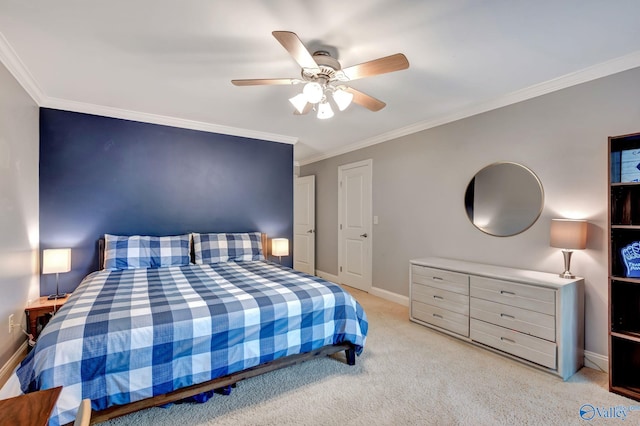 bedroom featuring baseboards, ornamental molding, and carpet floors