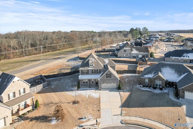 birds eye view of property with a residential view