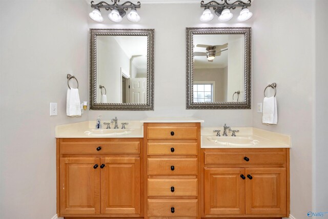 full bath featuring double vanity and a sink