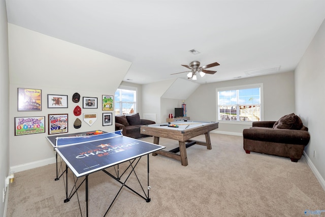 playroom featuring baseboards, plenty of natural light, and light colored carpet