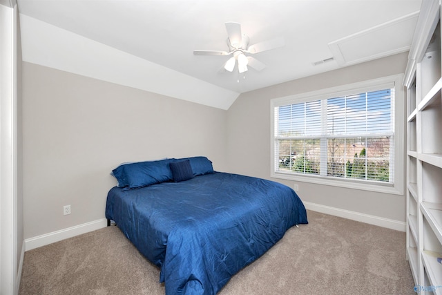 bedroom featuring attic access, lofted ceiling, carpet, baseboards, and visible vents
