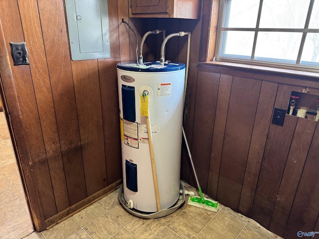 utilities with water heater and electric panel