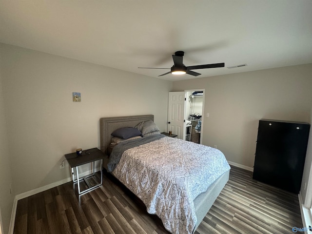 bedroom featuring dark hardwood / wood-style flooring and ceiling fan