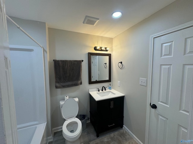 full bathroom featuring toilet, tub / shower combination, and vanity