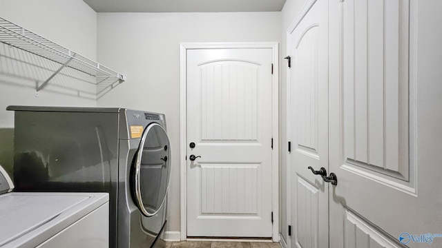 laundry area with laundry area and washing machine and dryer