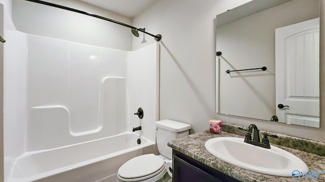full bathroom with shower / bathtub combination, toilet, and vanity