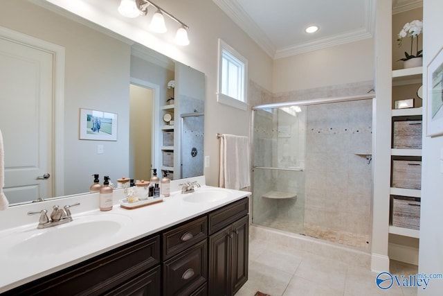 bathroom featuring an enclosed shower, crown molding, vanity, and tile patterned floors