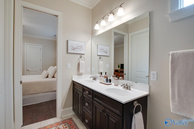 bathroom featuring vanity and ornamental molding