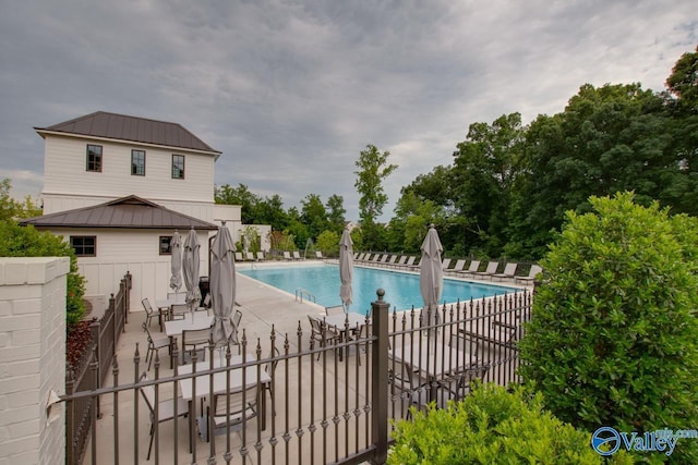 view of pool with a patio area