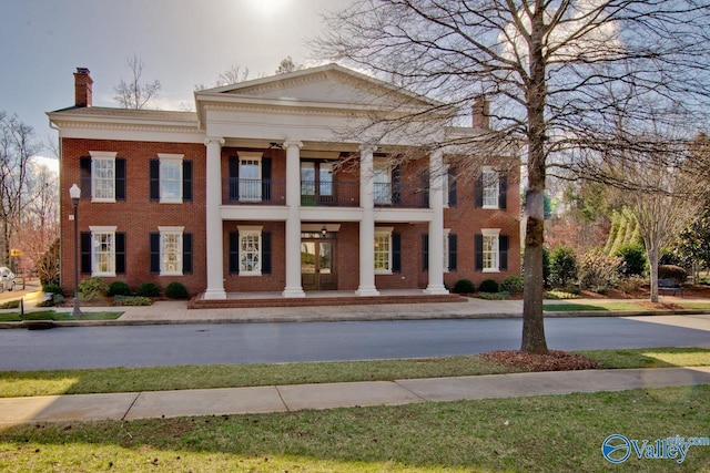 view of greek revival inspired property