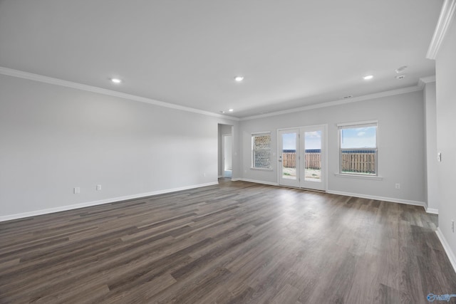 empty room with recessed lighting, baseboards, dark wood-style floors, and crown molding