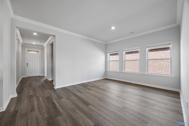 unfurnished room featuring recessed lighting, dark wood-style floors, baseboards, and ornamental molding