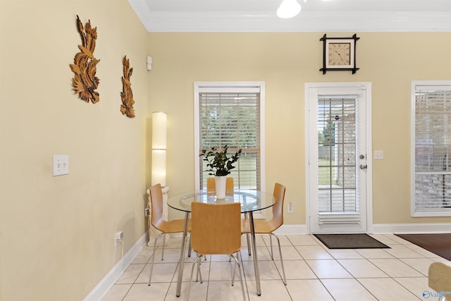 663 Gooch Ln, Madison, AL 35758 - tiled dining room with ornamental molding and baseboards
