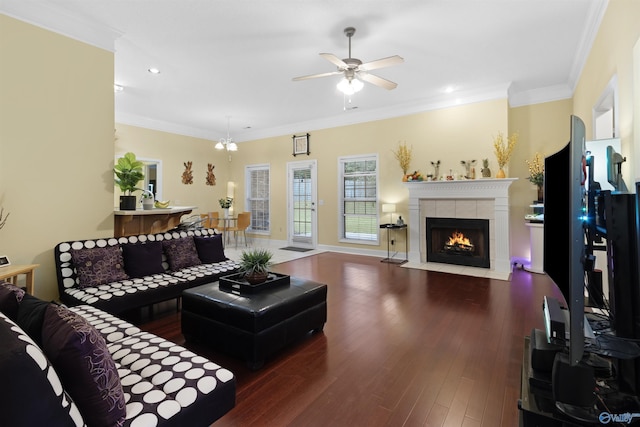 663 Gooch Ln, Madison, AL 35758 - living area with ceiling fan, a tile fireplace, wood finished floors, recessed lighting, and crown molding
