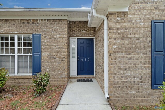 663 Gooch Ln, Madison, AL 35758 - property entrance featuring brick siding