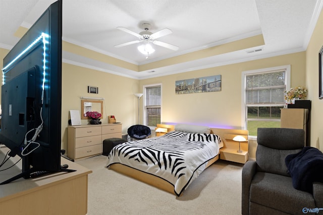 663 Gooch Ln, Madison, AL 35758 - bedroom featuring a raised ceiling, ornamental molding, light colored carpet, and a ceiling fan