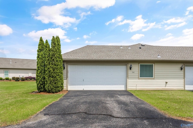 164 Moore Farm Cir NW, Huntsville, AL 35806 - view of front of property featuring an attached garage, a shingled roof, aphalt driveway, and a front yard